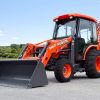 Kubota M62 Tractor/Loader/Backhoe Premium Cab